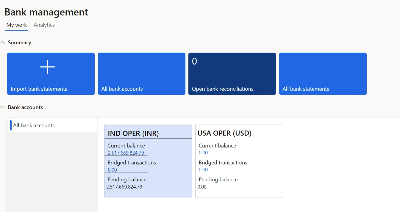 Bank management — My work. Shows the operational tiles — import bank statements, all bank accounts, open bank reconciliations and all bank statements — above a card for each bank account giving current balance, bridged (in-transit) transactions and pending balance. Use it as the treasury daily start page: the open reconciliations tile flags unreconciled accounts, and each card drills into the transactions behind the balance.